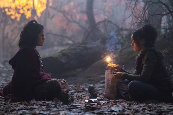 Belissa Escobedo as Izzy and Whitney Peak as Becca in the 2022 Disney+ film 'Hocus Pocus 2'.