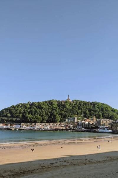 View of Monte Urgull from Paseo de La Concha Beach in San Sebastian