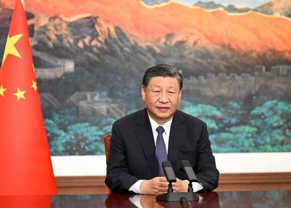 Chinese President Xi Jinping addresses the 2023 World Internet Conference Wuzhen Summit via video on Nov. 8, 2023. (Photo by Li Xueren/Xinhua via Getty Images)
