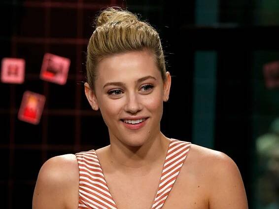 Image may contain Human Person Lili Reinhart Fashion Skin Clothing Apparel Premiere and Face