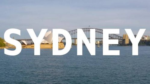 Free stock video - Opera house and harbour bridge in australia overlaid with animated graphic spelling out sydney