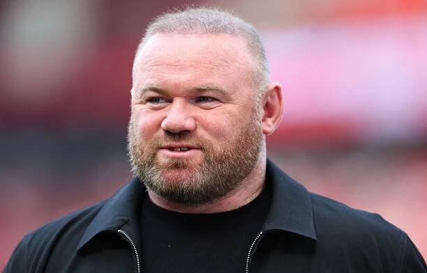 Wayne Rooney working as a pundit.