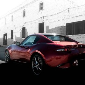 Jack Giambalvo Mazda is a Car Dealership near Lancaster PA | Rear view of 2020 Mazda Miata parked in alley