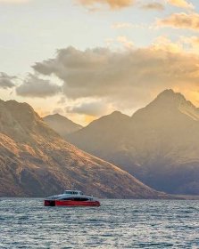 Southern Discoveries cruise on Lake Wakatipu during sunset in Queenstown