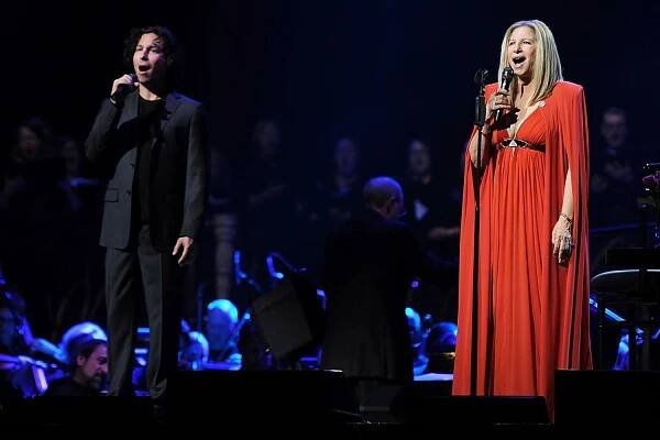 Musician Barbra Streisand performs with her sister Roslyn Kind and son Jason Gould on stage in concert at O2 Arena on June 1, 2013 in London, England. 