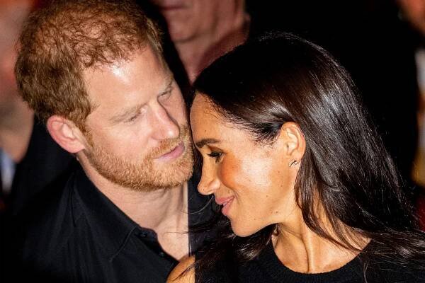 Prince Harry and Meghan Share Moment