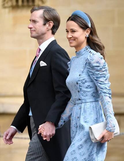 James Matthews and Pippa Middleton walking hand in hand in 2019