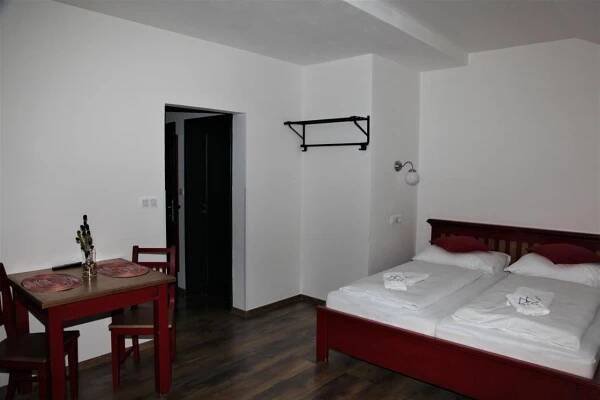 Ένα ή περισσότερα κρεβάτια σε δωμάτιο στο Aparthotel Mádr