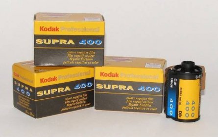 Photo of old Kodak film canisters.