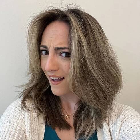 Image of a Womans hair after using Color Wow Root Lifter