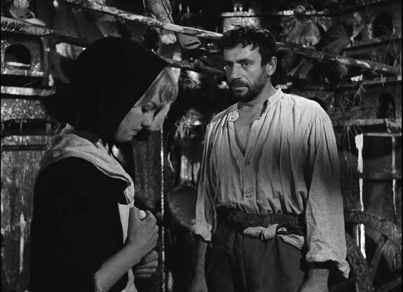 Mylène Demongeot and Yves Montand in Les sorcières de Salem (1957)