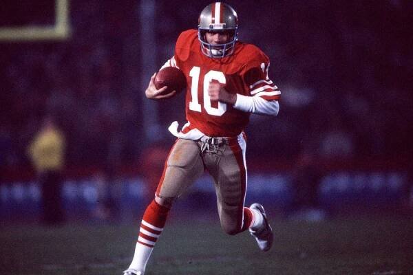 21 Jan 1985: Quarterback Joe Montana of the San Francisco 49ers runs during the Niners 38-16 victory over the Miami Dolphins in Super Bowl XIX at Stanford Stadium in Stanford, CA.