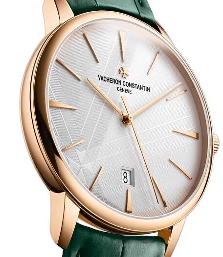 The Vacheron Constantin Patrimony Self-Winding features an 18K pink gold case, white patterned dial, gold hour markers, date at 6 o’clock, green leather strap, and bears the prestigious Geneva Seal.