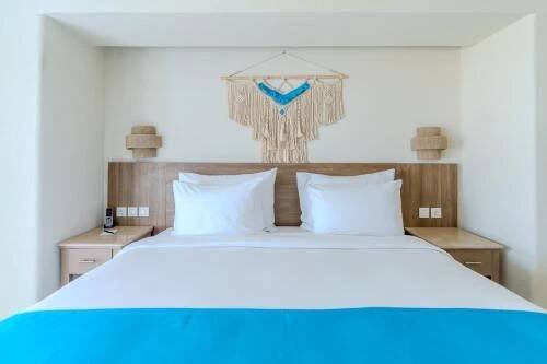 Postel nebo postele na pokoji v ubytování Casa Blue Resort