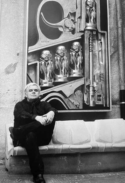 H.R. Giger with Machine Baby sculpture relief