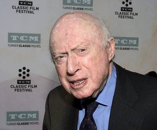 Actor Norman Lloyd poses during 50th anniversary screening of musical drama film 