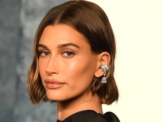 Hailey Bieber's Manicure Looks More Like Big Pink Pearls Than Fingernails — See the Photos
