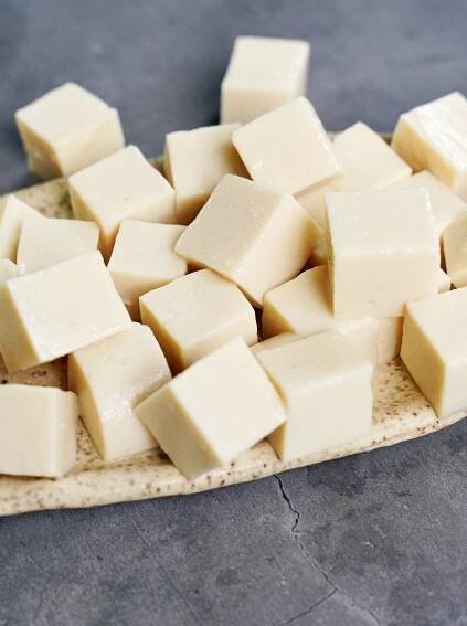 close-up of homemade white silken tofu cubes