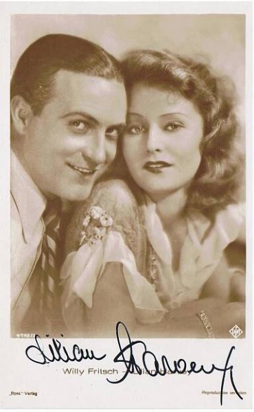Schwarz-weiß Porträt von Willy Fritsch und Lilian Harvey mit Unterschriften.
