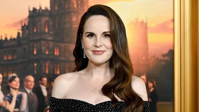 Michelle Dockery shows off growing baby bump at NYC premiere of Downton Abbey film