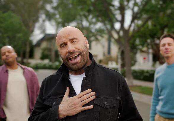John Travolta Goes Back to His Grease Roots for Super Bowl Ad with Zach Braff and Donald Faison