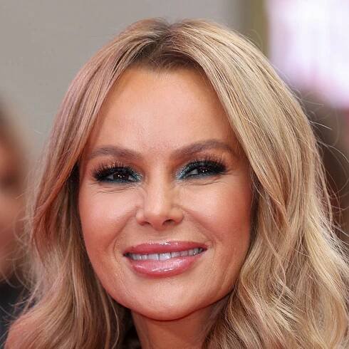 Amanda Holden is a bronzed goddess in daring cut-out mini dress