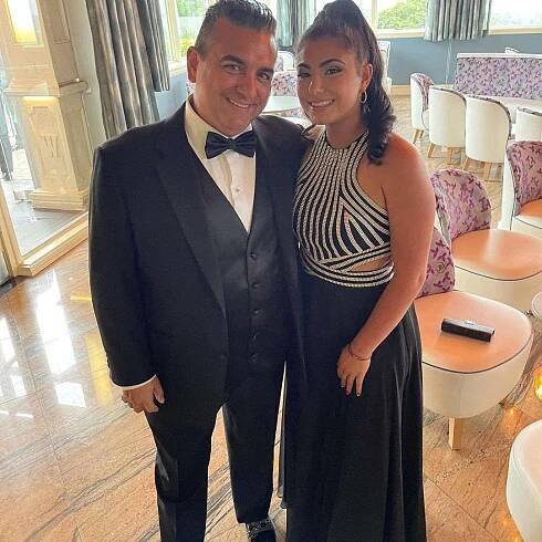 Buddy Valastro and his wife attending family wedding
