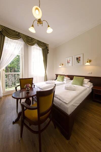 Postel nebo postele na pokoji v ubytování Parkhotel Richmond
