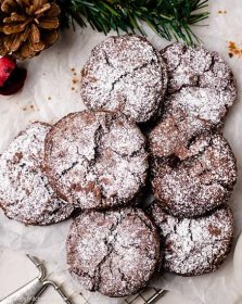 Crinkle cookies are laid perfectly on parchment paper