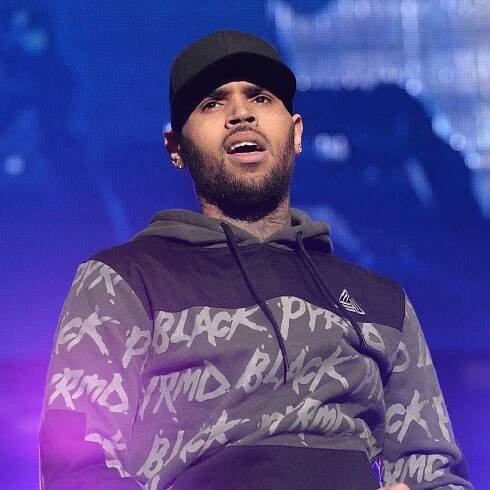 Chris Brown Hurls Racist Insult at Aziz Ansari in Attempt to Prove He's Not Like Donald Trump