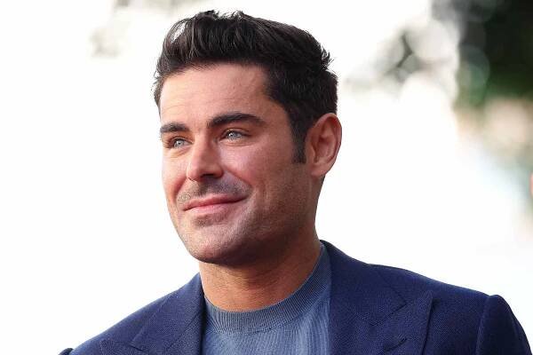 Zac Efron attends his Hollywood Walk of Fame Star Ceremony on December 11, 2023 in Hollywood, California.