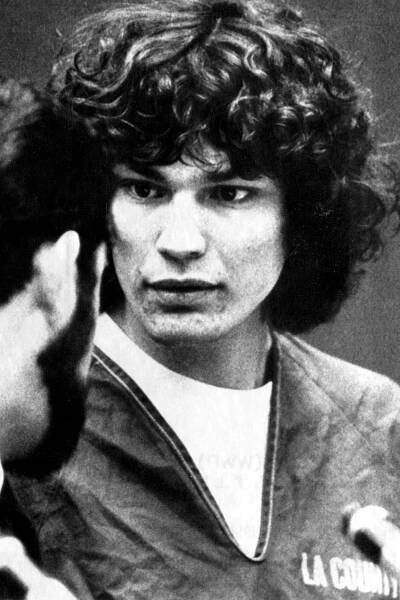"Night Stalker" Richard Ramirez confers with his attorney in a courtroom on May 21, 1986 in Los Angeles, CA.