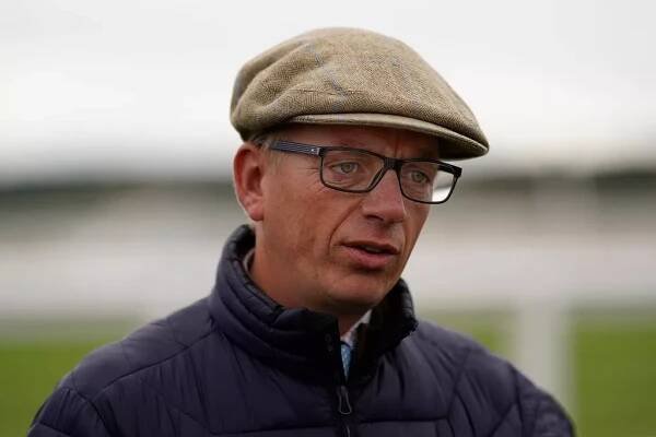 Trainer Warren Greatrex: taking part in a charity walk 