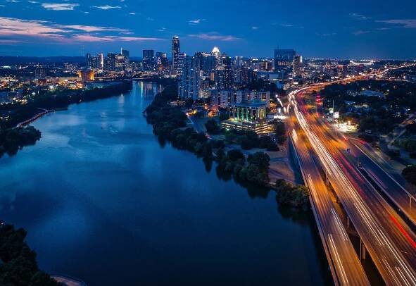 Downtown Austin, Texas during sunset featuring traffic on I-35