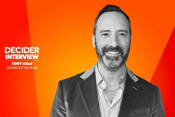 Tony Hale in black and white on a bright orange background