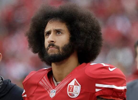 Colin Kaepernick, Who Began Anthem Kneeling, Files Complaint Against N.F.L.