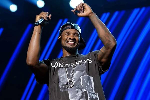 Usher performs onstage during Day 2 of the 2024 ESSENCE Festival of Culture presented by Coca-Cola at Caesars Superdome on July 06, 2024 in New Orleans, Louisiana. 