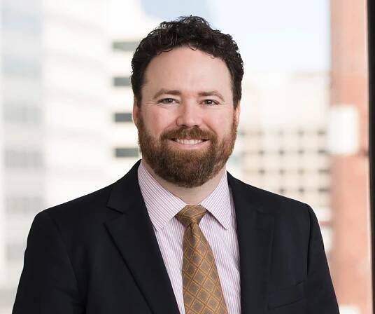 Jake Scott, Partner, Smith, Currie & Hancock LLP