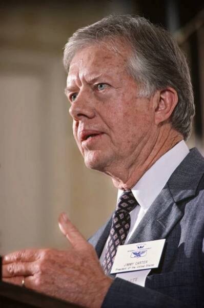 President Jimmy Carter addresses the assemblage of Academy participants during the 1984 Salute to Excellence program at the historic Lafayette Club outside of Minneapolis, Minnesota.
