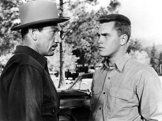 Red Skies of Montana, from left: Richard Boone, Jeffrey Hunter, 1952.