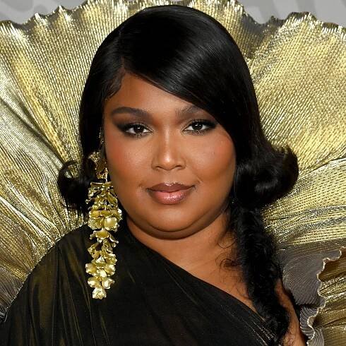 If You Missed the Brit Awards, Don't Miss Lizzo's Swoopy Bob and Massive Feather Clam Shell — See Photo