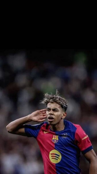 a soccer player with his hand on his head