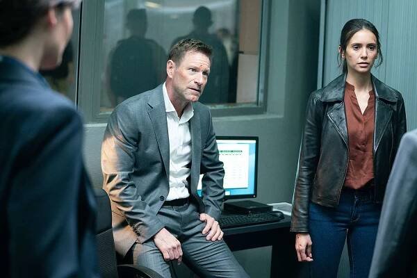 Aaron Eckhart and Nina Dobrev Go on a Manhunt in Action-Packed Trailer for 'The Bricklayer' (Exclusive)