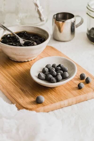 Close up of raw homemade tapioca pearls in a dish.