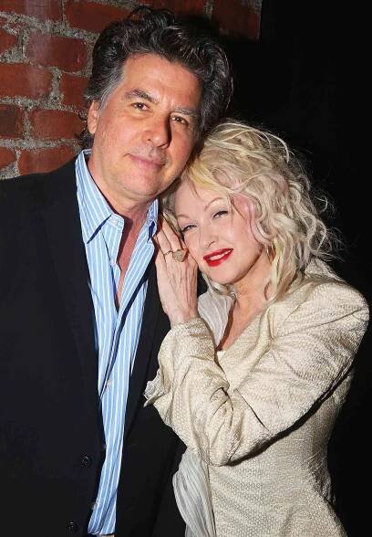 David Thornton and wife Cyndi Lauper pose backstage as the hit musical 