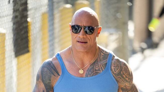 Dwayne Johnson is all about tiny vests and big biceps