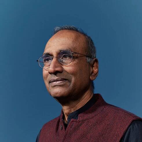 Image may contain Venkatraman Ramakrishnan Face Head Person Photography Portrait Happy Smile Adult and Accessories