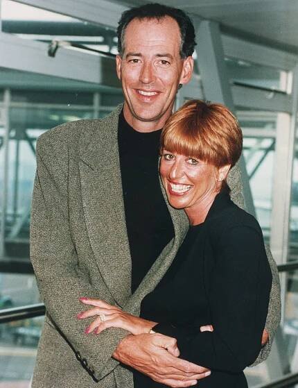 Michael Barrymore and his wife Cheryl at Heathrow Airport.