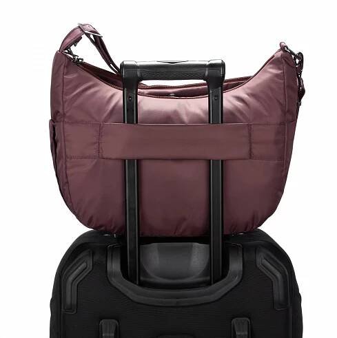 Velká bezpečnostní kabelka z recyklovaných PET lahví Pacsafe Cruise Carry All Crossbody pinot | e-TASKY.cz