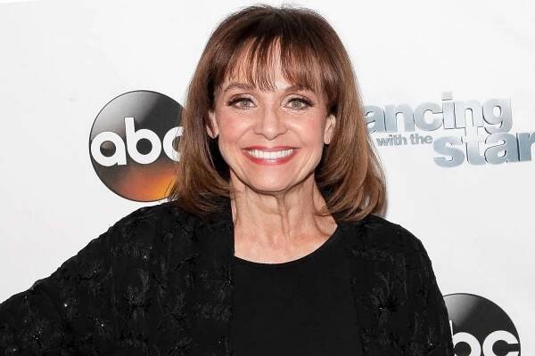 Ed Asner, Jesse Tyler Ferguson, Topher Grace, and more pay tribute to Valerie Harper